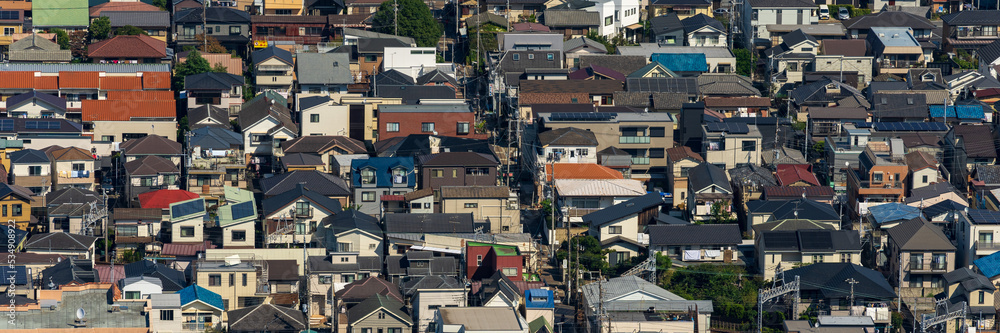 Greater Tokyo are dense buildings and houses at daytime. Greater Tokyo are dense buildings and houses at daytime.
