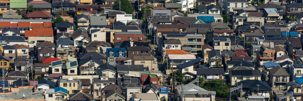 Greater Tokyo are dense buildings and houses at daytime.