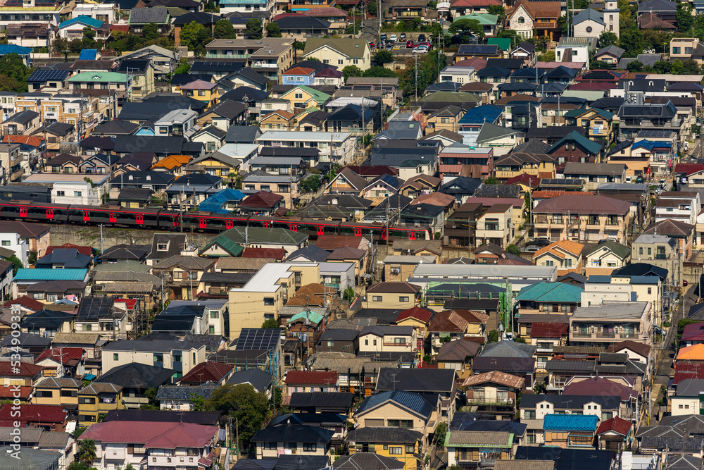 Fototapeta premium Greater Tokyo are dense buildings and houses at daytime.