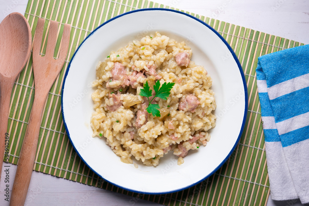 Catalan butifarra sausage risotto with parmesan. Mixed Spanish and Italian recipe.