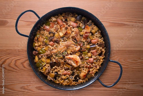 Rabbit and sausage paella. Typical Spanish paella tapa recipe with meat.