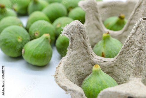 green figs on a white background 