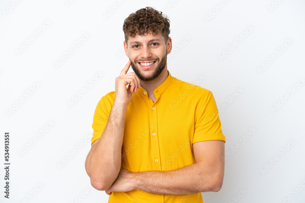 Young handsome caucasian man isolated on white background laughing Young handsome caucasian man isolated on white background laughing