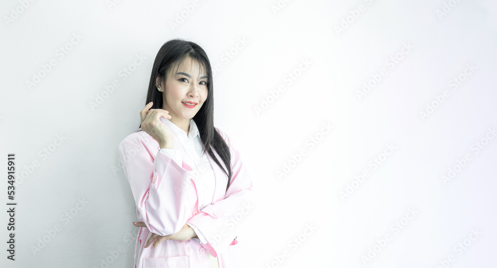 Beautiful Asian woman doctor with copy space on white background, Asian woman doctor in uniform pink coat, Medical and healthcare. Beautiful Asian woman doctor with copy space on white background, Asian woman doctor in uniform pink coat, Medical and healthcare.