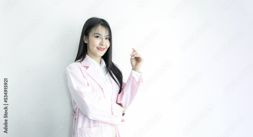 Beautiful Asian woman doctor with copy space on white background, Asian woman doctor in uniform pink coat, Medical and healthcare. Beautiful Asian woman doctor with copy space on white background, Asian woman doctor in uniform pink coat, Medical and healthcare.