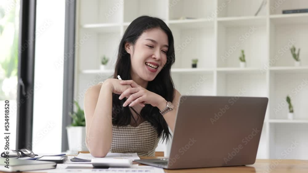 woman smiling and talking for the camera at home office, online meeting communicating with business. woman smiling and talking for the camera at home office, online meeting communicating with business.