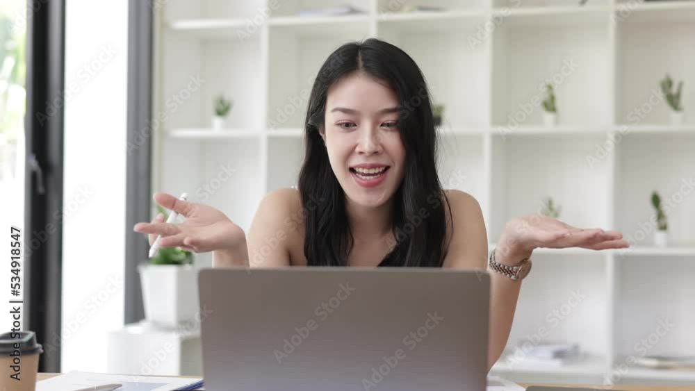 woman smiling and talking for the camera at home office, online meeting communicating with business. woman smiling and talking for the camera at home office, online meeting communicating with business.