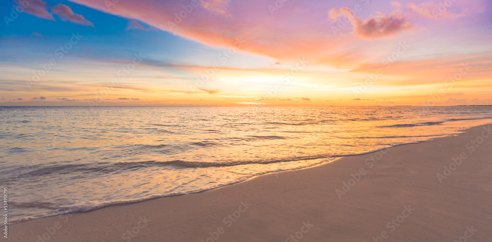 Closeup sea sand beach. Panoramic beach landscape. Inspire tropical beach seascape horizon. Majestic sunset sky reflection calm tranquil relaxing sunlight summer mood. Mediterranean seaside vacation