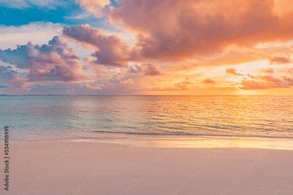 Closeup sea sand beach. Panoramic beach landscape. Inspire tropical beach seascape horizon. Majestic sunset sky reflection calm tranquil relaxing sunlight summer mood. Mediterranean seaside vacation