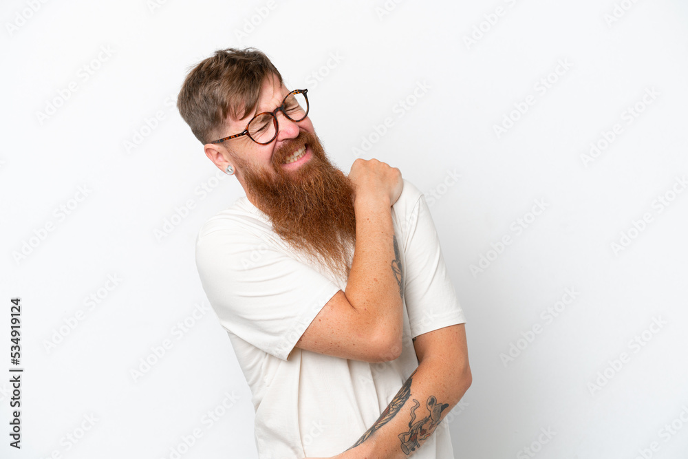 Redhead man with long beard isolated on white background suffering from pain in shoulder for having made an effort Redhead man with long beard isolated on white background suffering from pain in shoulder for having made an effort