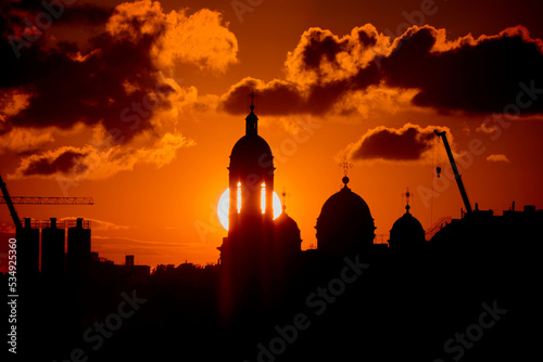 Silhouette of the church lit in the sunshine. St. Petersburg