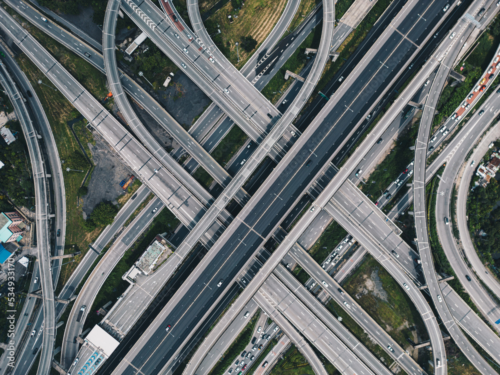 Aerial view city junction cross road with vehicle