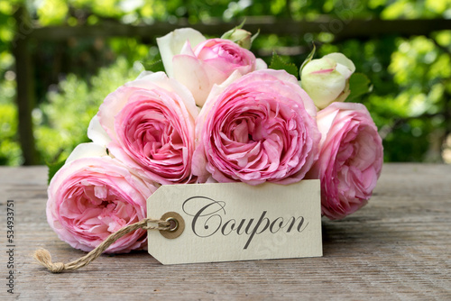 Coupon with a bouquet of pink roses