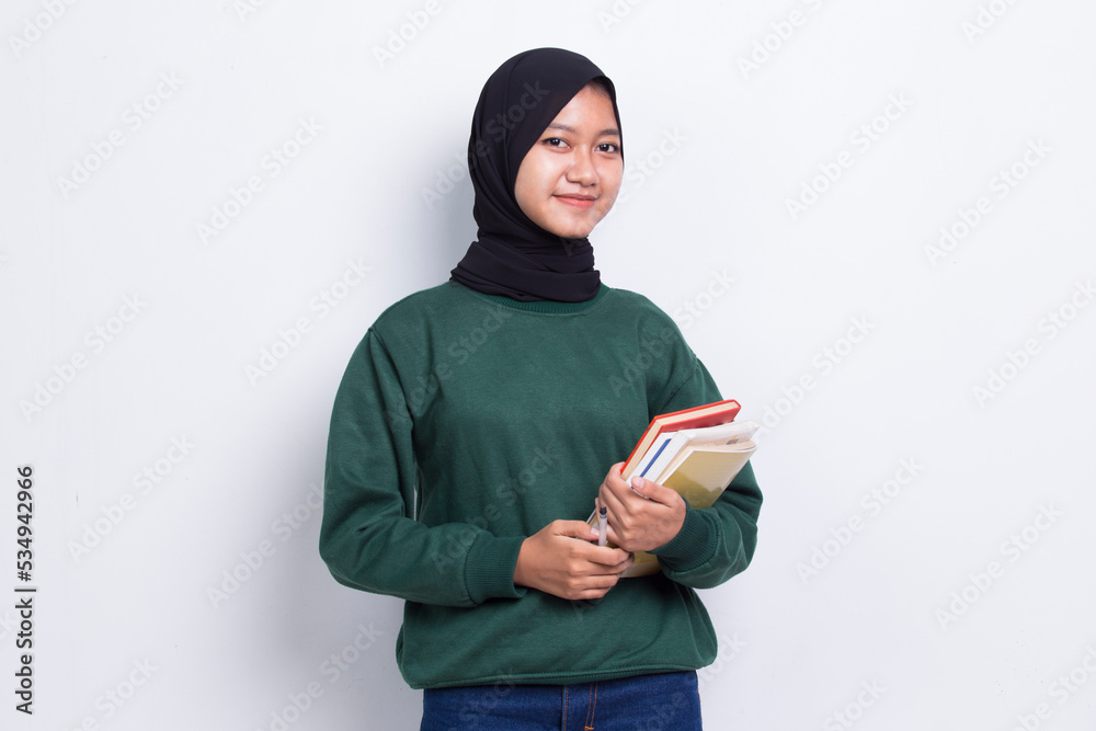 beautiful asian muslim woman hug a book fist and tumb up ok isolated on white background
beautiful asian muslim woman hug a book fist and tumb up ok isolated on white background