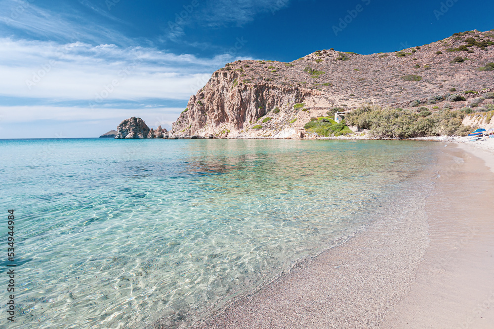Plathiena beach with crystalline water on Milos island in Greece. Plathiena beach with crystalline water on Milos island in Greece.
