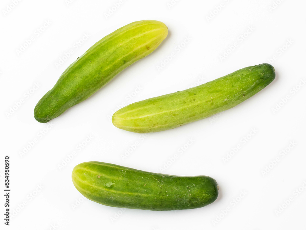 Cucumber on white background top view. Cucumber on white background top view.