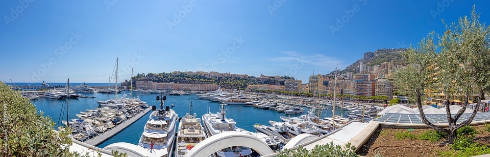 Panoramic view of the harbour and the cityscape of Monaco during the day