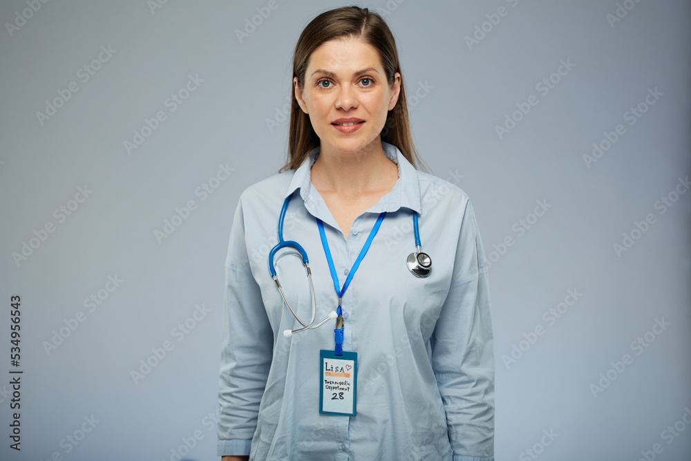Woman doctor in blue medical uniform. Isolated portrait of female medical worker.
