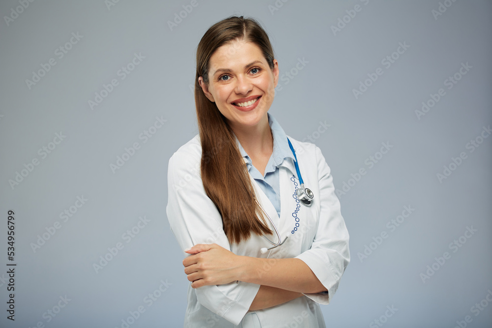Smiling doctor woman in medical uniform. Isolated portrait of female medical worker. Smiling doctor woman in medical uniform. Isolated portrait of female medical worker.