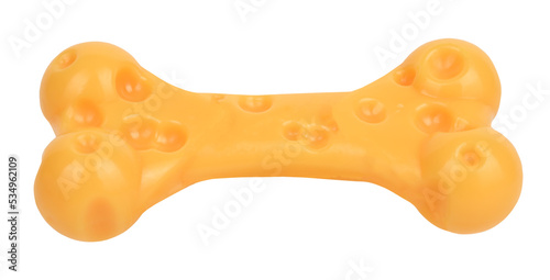 Yellow dog bone pet toy made of plastic nylon shaped as cheese. Toys for dogs concept
