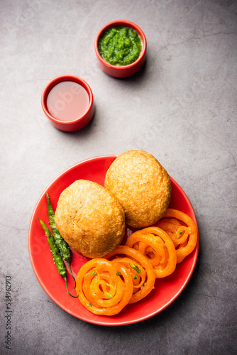 Kachori with Jalebi, snack combination from India also called kachauri, kachodi, katchuri, imarti photo