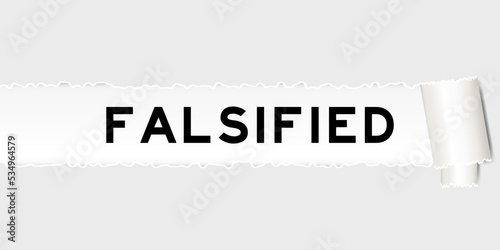 Ripped gray paper background that have word falsified under torn part