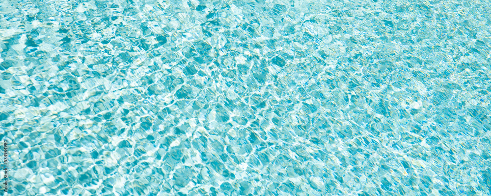 turquoise color background of swimming pool water with ripples in maldives