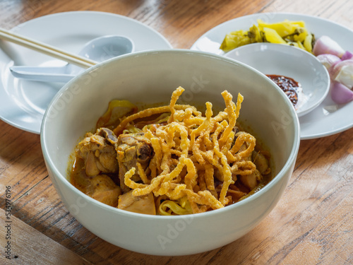 Khao soi, the northern Thailand's signature and famous dish. Thai food concept with selective focus.
