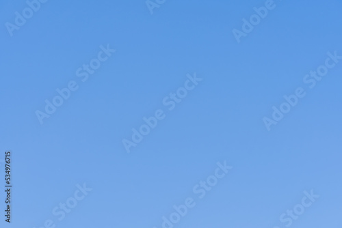 Fototapeta Naklejka Na Ścianę i Meble -  Real clear blue sky without clouds background at mid latitudes 10-12 noon.