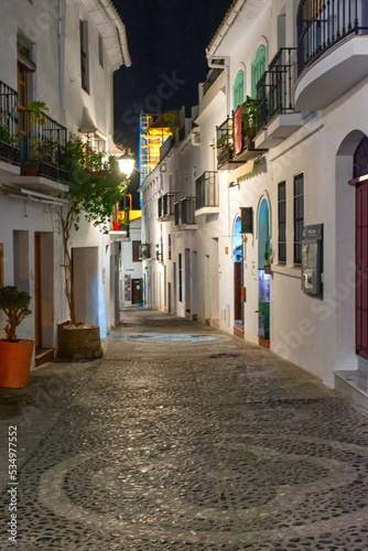 Quiet street of the town of Frigiliana  a traditional white village in the mountain of the coast of Malaga  Spain. Pueblo blanco de la costa de Malaga  Frigiliana  Espa  a
