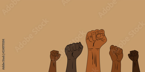 Concept of the unity of different races and genders in the world. Black lives matter. Many raised fists of different skin tones and colors. Strong people stand up for their rights fight for freedom