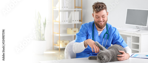 Male veterinarian with Scot...