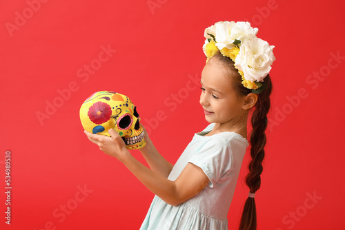 Little Mexican girl in flor...