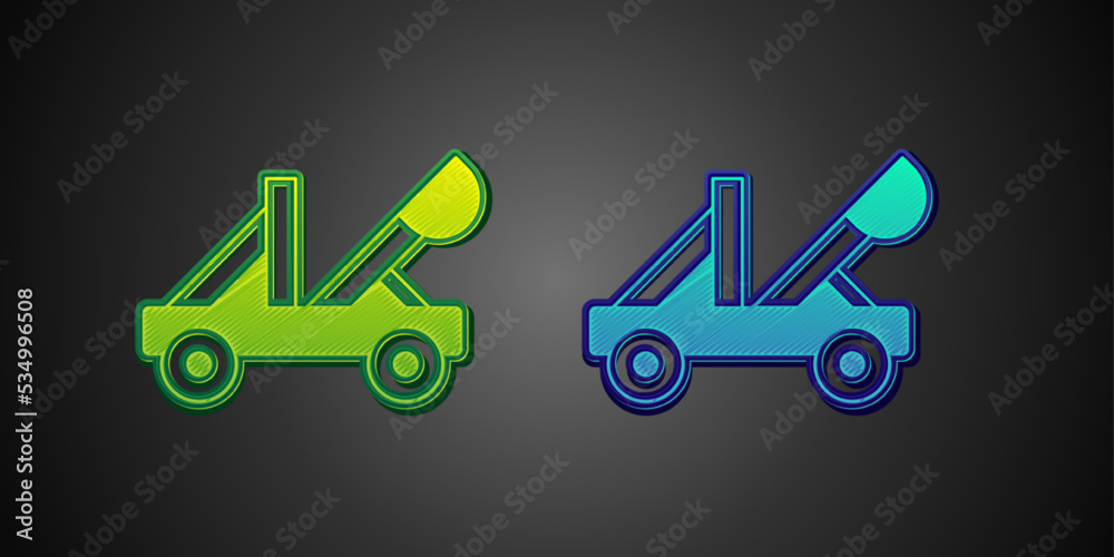 Green and blue Old medieval wooden catapult shooting stones icon isolated on black background. Vector Green and blue Old medieval wooden catapult shooting stones icon isolated on black background. Vector
