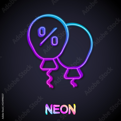 Glowing neon line Discount percent tag icon isolated on black background. Shopping tag sign. Special offer sign. Discount coupons symbol. Vector