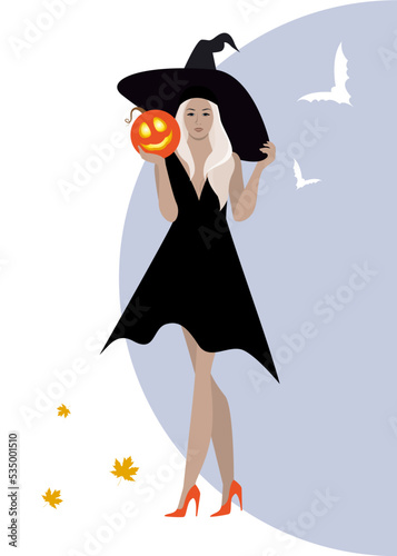 Halloween beautiful witch with pumpkin a hat