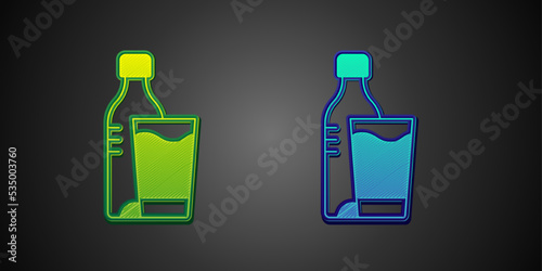 Green and blue Bottle of water with glass icon isolated on black background. Soda aqua drink sign. Vector