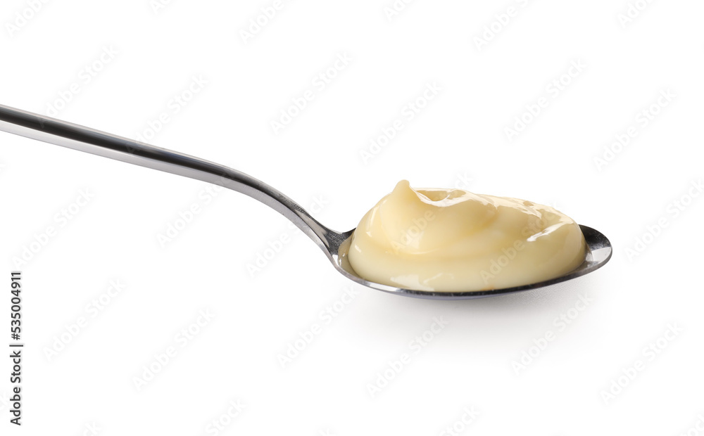 Spoon with tasty vanilla pudding on white background Spoon with tasty vanilla pudding on white background