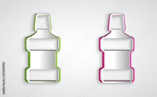 Paper cut Mouthwash plastic bottle icon isolated on grey background. Liquid for rinsing mouth. Oralcare equipment. Paper art style. Vector