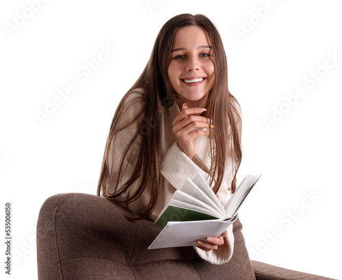 Smiling young woman reading...