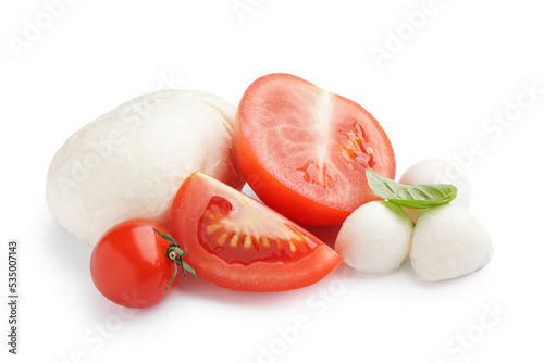 Delicious mozzarella cheese and tomatoes on white background
