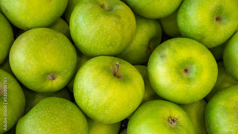 Green delicious juicy fresh fruit apples background Green delicious juicy fresh fruit apples background