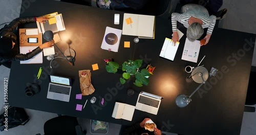 Night business time lapse, office team planning and working late with speed, commitment and collaboration in startup agency. Above of fast designer workforce, creative teamwork and evening strategy