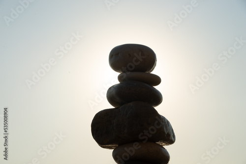 pebbles on top of each other on a beach