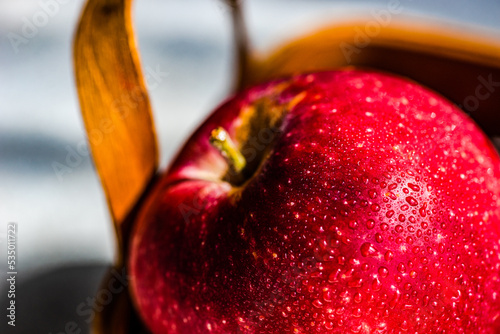 Close-Up of a red apple in a basket photo