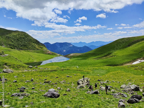 trekking at lake Dimon on the mountains of the Carnic Alps photo