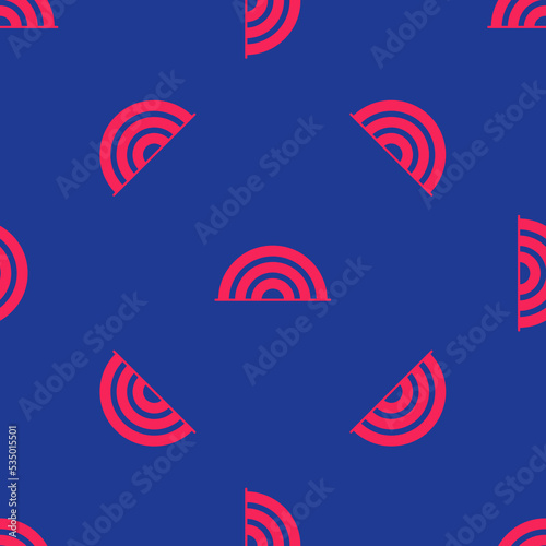 Red Rainbow icon isolated seamless pattern on blue background. Happy Saint Patricks day. National Irish holiday. Vector