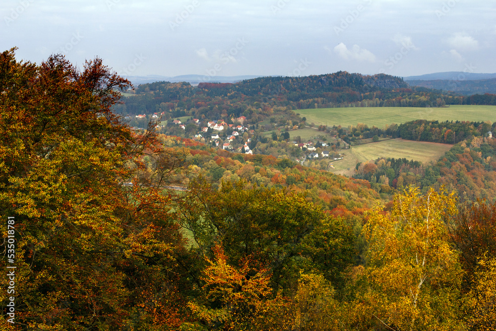 View of a village in the countryside in autumn near  Saxon Switzerland Mountains. Dresden. Germany. 