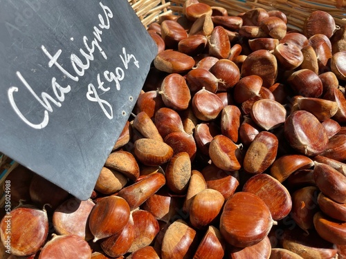 Close-up of chestnuts for sale in a weekly market, Maussane-les-Alpilles, Bouches-du-Rhone, Provence-Alpes-Cote-d'Azur, France photo