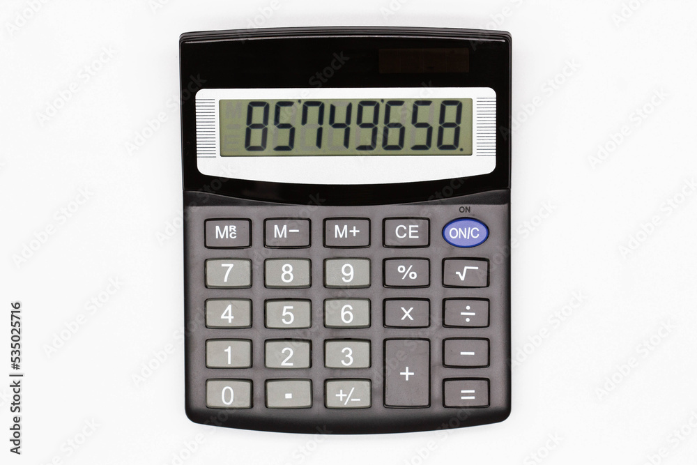 Calculator with big buttons with numbers on the digital screen on a white background. Isolated. Solar powered financial calculator. Electronic machine for math. Business office supplies. Close-Up Calculator with big buttons with numbers on the digital screen on a white background. Isolated. Solar powered financial calculator. Electronic machine for math. Business office supplies. Close-Up